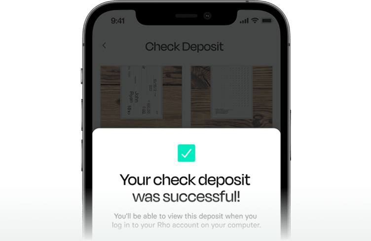 A smartphone screen showing a successful check deposit notification with an image of a check in the background.